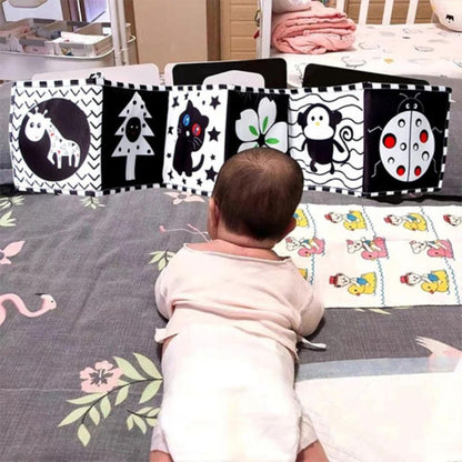 Busy Board Bébé : Le Livre d'Éveil en Tissu - BABYSBLOU