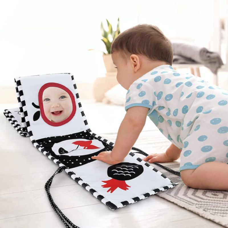 Busy Board Bébé : Le Livre d'Éveil en Tissu - BABYSBLOU