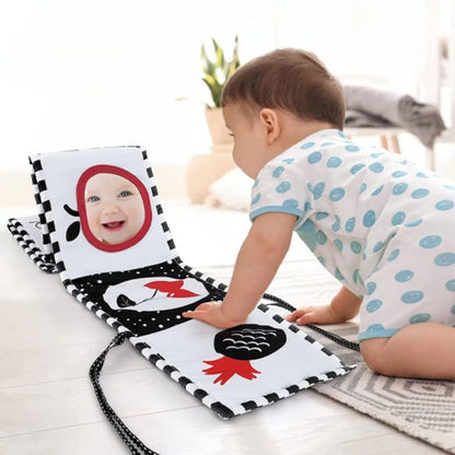 Busy Board Bébé : Le Livre d'Éveil en Tissu - BABYSBLOU